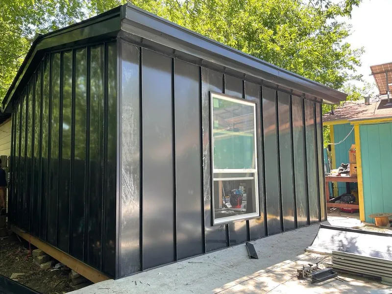 Black standing seam metal wall panels for Roof Inspection in Carnegie